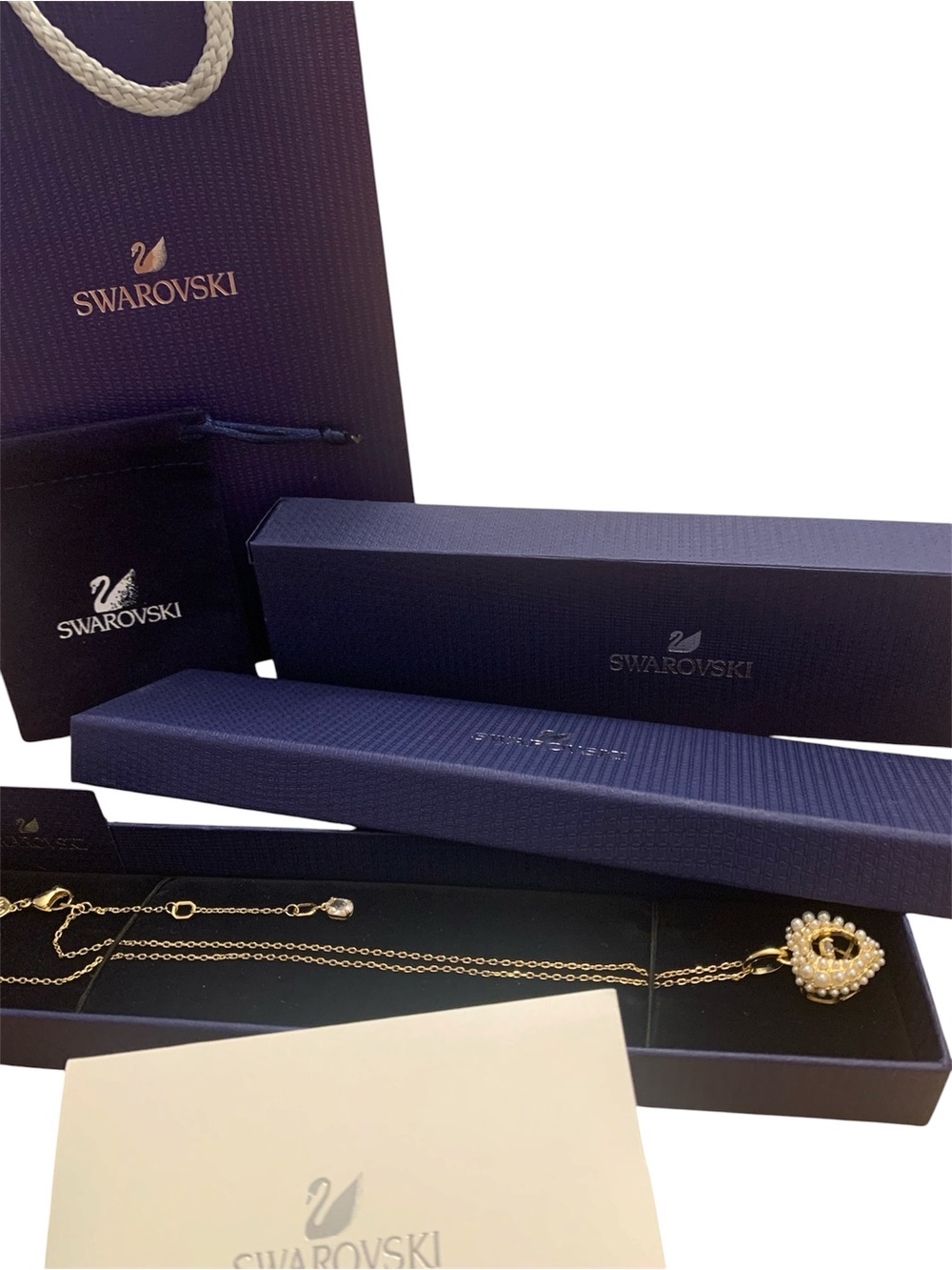 Swarovski Hyperbola pendantCrystal pearl, Heart, White, Gold-tone plated